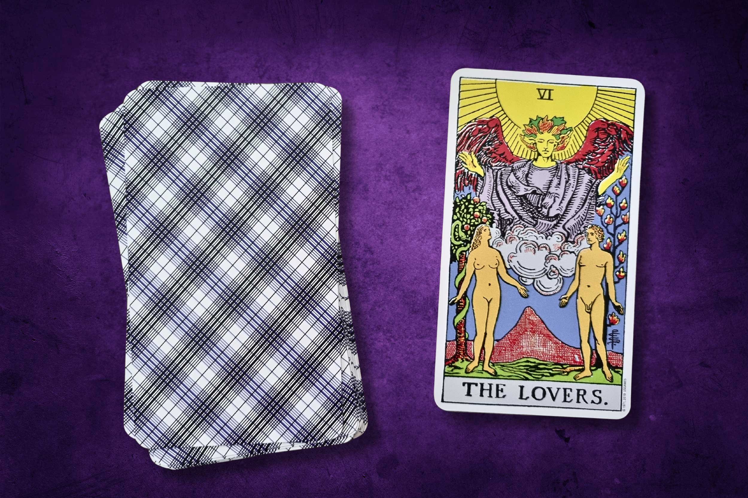 Tarot cards with the Lovers revealed.